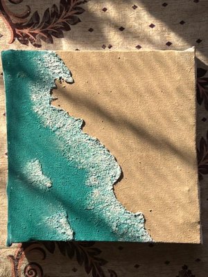Ocean waves over the beach sands by Mohammed